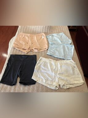 Old Navy Four-Pack Elastic Waist Shorts - White, Light Blue, Blush, Black